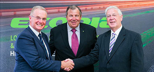 Two girls walking in long grass
